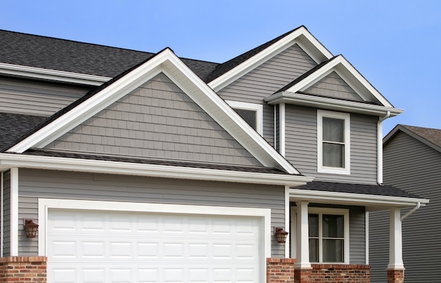 new house with several vinyl types of siding new house with several vinyl types of siding