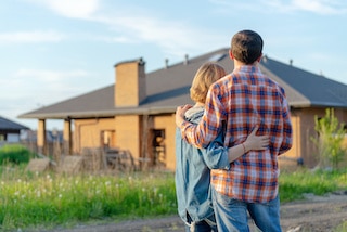 couple trying to decide on buying a house after roof inspectors report couple trying to decide on buying a house after roof inspectors report