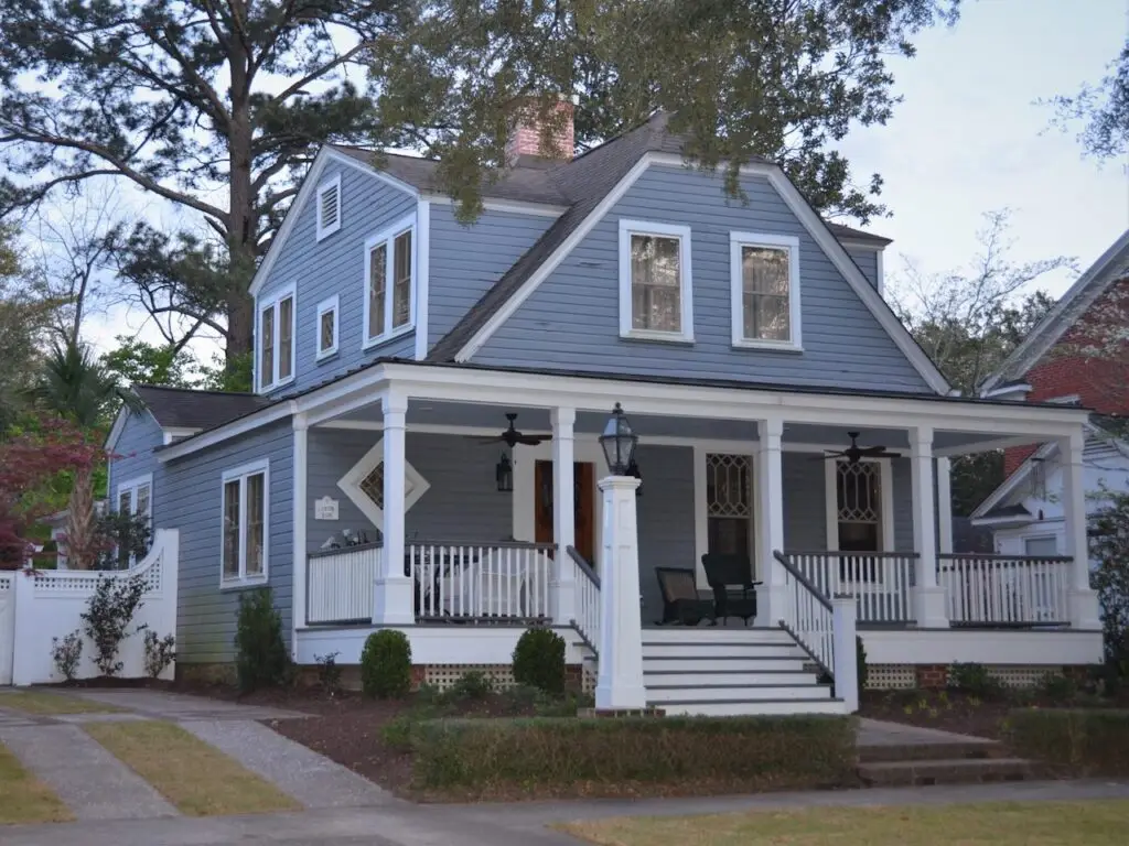 blue home with large front porch