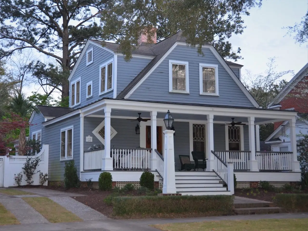 blue home with large front porch