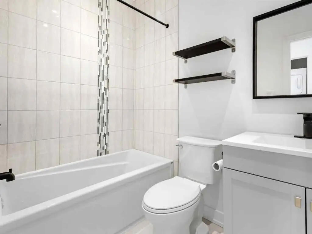 white bathroom with tub